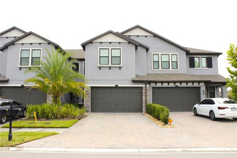 Photo of 4596 Almada Lane, Wesley Chapel, FL 33543 (MLS # TB8437166)