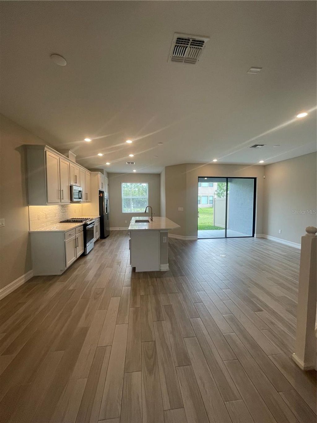 Photo of 4596 Almada Lane, Wesley Chapel, FL 33543 (MLS # TB8437166)