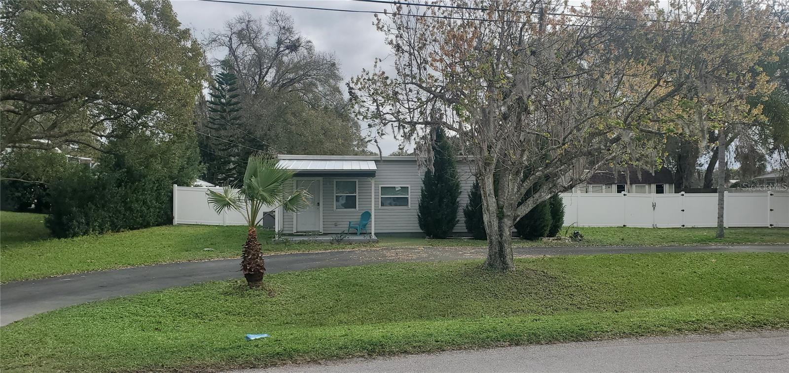 Great rental home with access to three ski lakes. Lake Padgett, Saxon Lake and East Lake. Park your RV, Boat, Jet Ski's in the privacy of your backyard when your not using them. Large Storage shed for all your extra stuff. Access to private lakes with boat ramp, pavilions, grills, sand volleyball, playground and tennis courts. Washer and dryer included. Vinyl fence yard with astroturf and its own putting green. Close to HWY 41. Minutes from Lowes, Restaurants and Grocery Stores. About 35 minutes from Tampa International Airport. An hour from Florida Beaches. Minutes from Golf Courses and Public Parks.