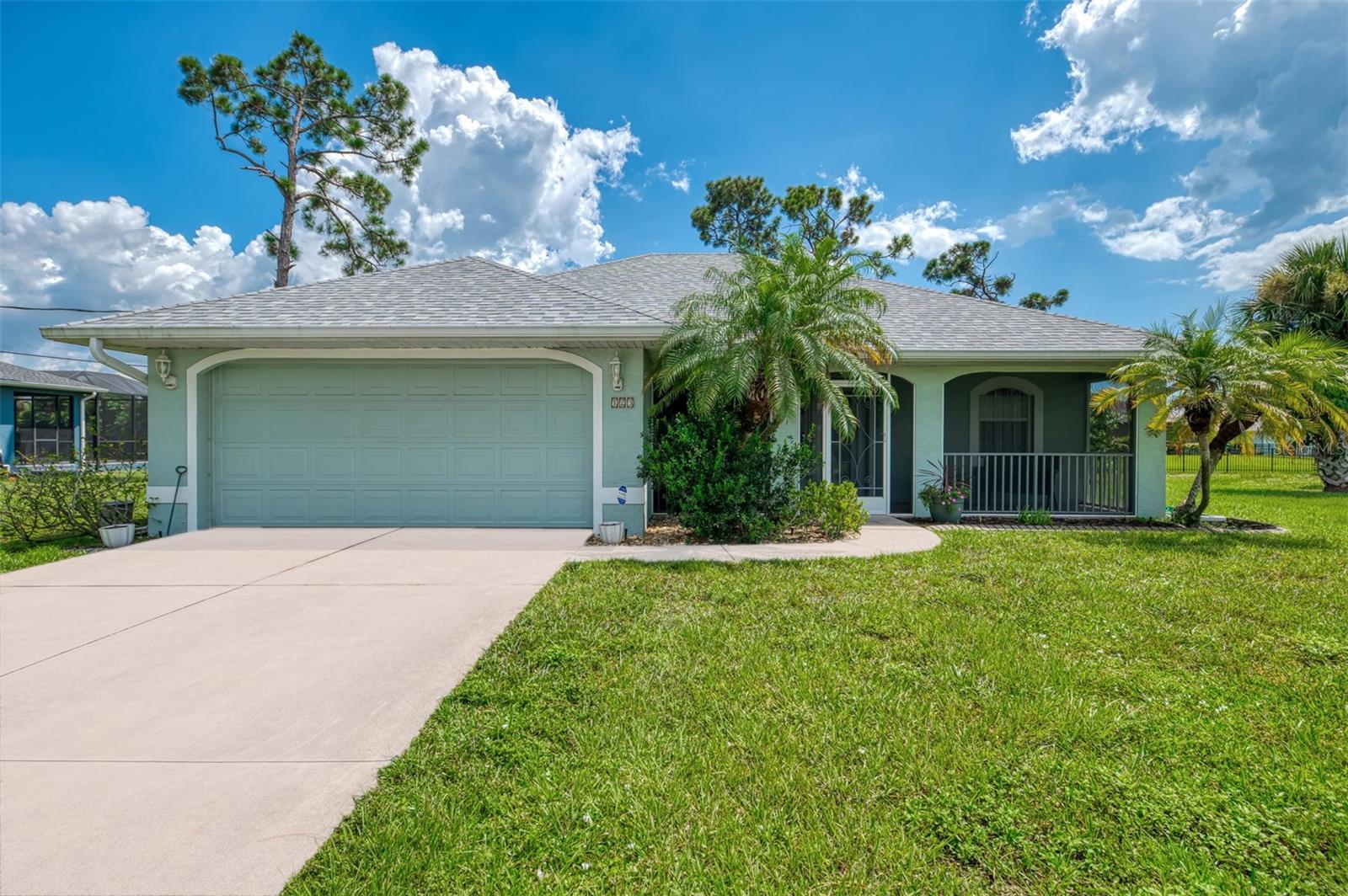 Rotonda West Gem on Half an Acre – Move-In Ready with Hot Tub and New Upgrades! Located in the peaceful and popular Rotonda West community, this well-cared-for 3-bedroom, 2-bath home offers the perfect blend of comfort, space, and Florida charm—all on a rare .45-acre lot! With a new roof (2023), new A/C (2021), and new hot water heater (2022), this home is completely move-in ready and built for easy living. Step inside and enjoy the bright, open floorplan that brings everyone together. The heart of the home is the large center island breakfast bar with solid surface counters—perfect for meals, snacks, or catching up with friends. The kitchen flows into a cozy great room with tile floors and sliding doors that lead to the spacious 22-ft screened lanai. Out back, a heated hot tub invites you to relax any time of day. The breakfast room also opens to the lanai, making indoor-outdoor living a breeze. Want more fresh air? Head to the 25-ft country-style screened front porch—a peaceful spot to sip your morning coffee or enjoy the evening breeze. Inside, the master bedroom is your personal retreat with waterproof vinyl laminate floors, a large walk-in closet, sliding doors to the lanai, and an en-suite bath with a tub/shower combo. The guest suite features pocket doors that separate two bedrooms and a bath with a walk-in shower—great for added privacy. The home includes a handy inside laundry room with built-in shelving and a newer washer and dryer. Hurricane protection is already in place with accordion shutters, a clear shutter for the dining area, and an electric hurricane screen that covers the entire back of the home and front door for added peace of mind. Enjoy the beauty of this large lot with room to garden, play, or just enjoy the quiet. Rotonda West offers parks, public golf courses, shopping, dining, and is just minutes from beautiful Gulf beaches and Boca Grande, known for world-class tarpon fishing. Not in a flood zone! Just unpack and start living the Florida lifestyle you've been waiting for.