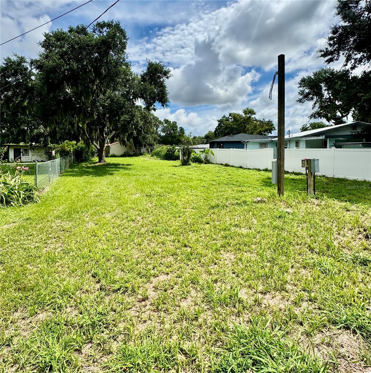 Amazing opportunity to own a beautiful vacant lot in nice quiet Frostproof neighborhood. Build your new construction home or install a mobile home! All utilities ready for connection! You will love the gorgeous view of Reedy Lake from the front yard and NO HOA! Enjoy the friendly peaceful charm of small town living yet only about an hour drive to Orlando or Tampa! Easy access to main roads, only a short 20 minute drive to shopping mall and dining! Priced to sell! Do not let this opportunity pass you by!