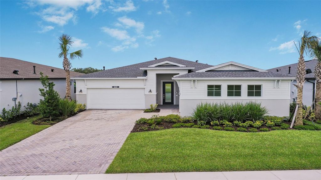 Photo of 14448 Woodland Preserve Trail, Parrish, FL 34219 (MLS # O6317021)