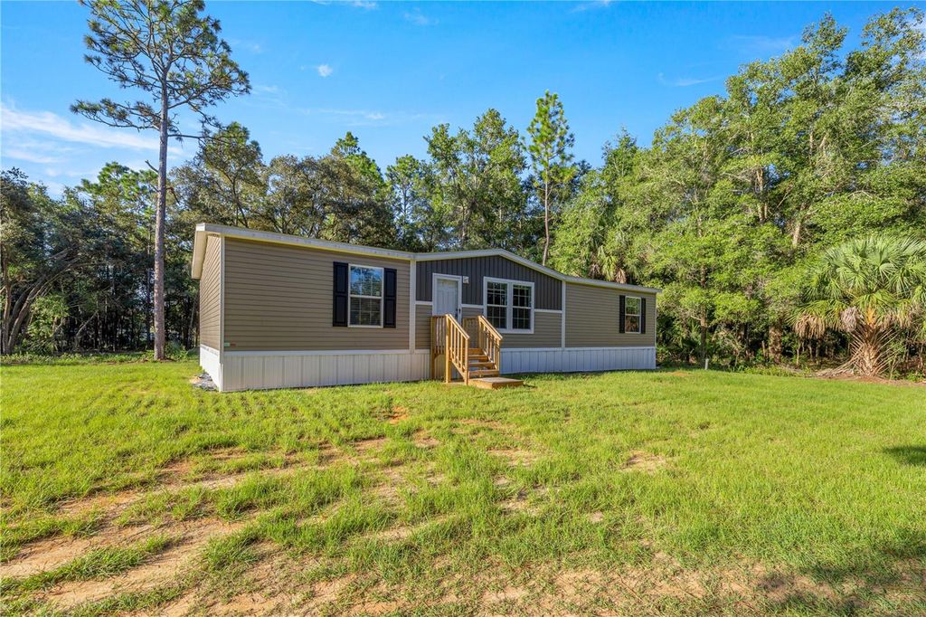 Photo of 9790 W Pinespring Court, Crystal River, FL 34428 (MLS # OM711862)