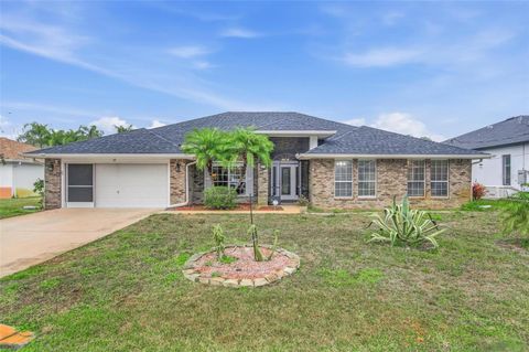 Photo of 27 Burning Bush Drive, Palm Coast, FL 32137 (MLS # FC315040)
