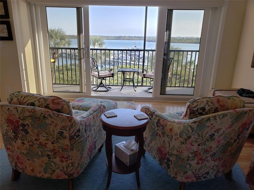 A rare direct intracoastal condo in Inlet Marina Villas. Take in expansive water views with amazing sunsets from your 3rd floor balcony and enjoy very fine interior finishes.  The home was completely remodeled in 2018 with granite and quartz countertops, upper end kitchen cabinets, stainless steel appliances, a reverse osmosis water system, hardwood flooring, upgraded lighting and fans, walk-in master shower. Washer and dryer in 2021. All protected with new hurricane rated windows and doors. Inlet Marina Villas is a well maintained and managed gated North Beach complex directly on the intracoastal with a 64 slip deep water marina, heated pool, lighted tennis courts, kayak storage and launch, clubhouse, a dockside gazebo with grills and kitchen and covered parking.  All the amenities that you'd expect. ;Water: City