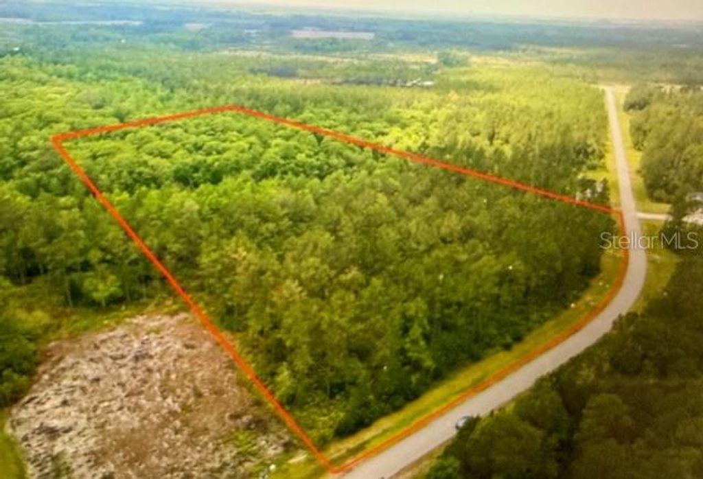 Photo of 106 Creekside Drive, Bunnell, FL 32110 (MLS # FC318204)