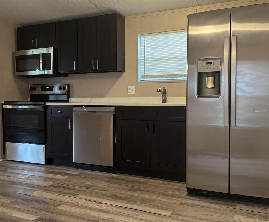 Photo of 5010 Ewell Road, Lakeland, FL 33811 (MLS # A4667214)