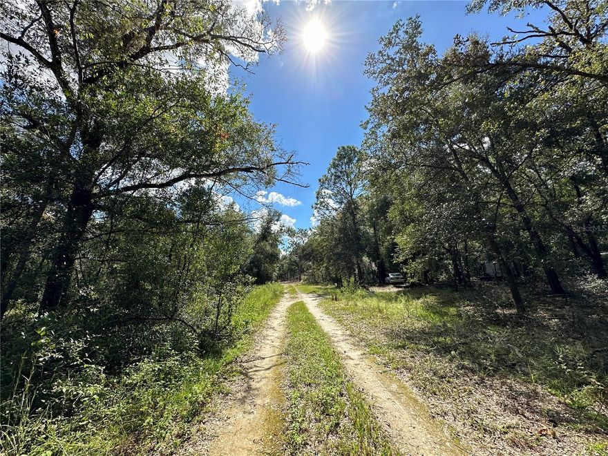 OWNER FINANCING on WILLISTON HIGHLANDS GOLF & COUNTRY CLUB ESTATES BUILDING LOT. Lot measures approximately .23 acres and measures about 80' wide on the road and 125' deep. This pretty, high and dry, level, lot would provide a great setting for you new site-built or manufactured home. Located just 5 minutes from local shopping, schools and restaurants. Possible Owner Financing on a Contract for Deed.