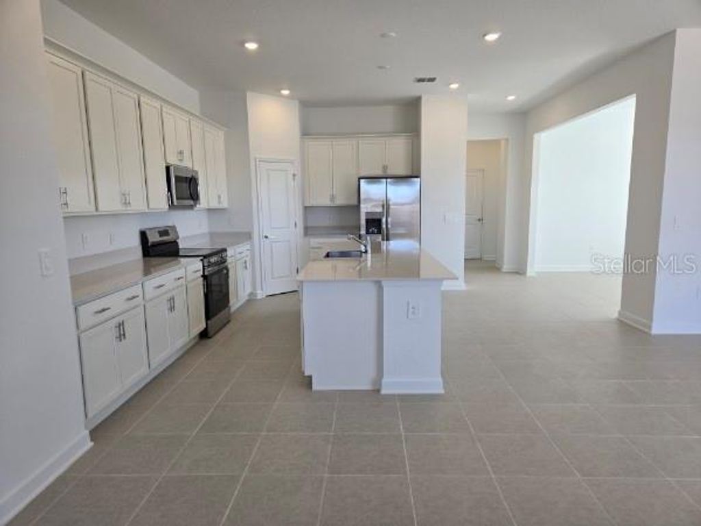 Photo of 4894 Waltham Forest Drive, Davenport, FL 33837 (MLS # O6379427)