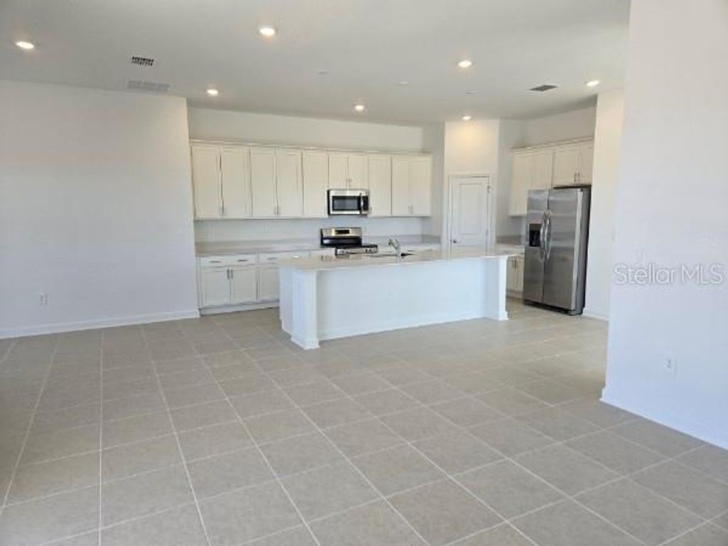 Photo of 4894 Waltham Forest Drive, Davenport, FL 33837 (MLS # O6379427)