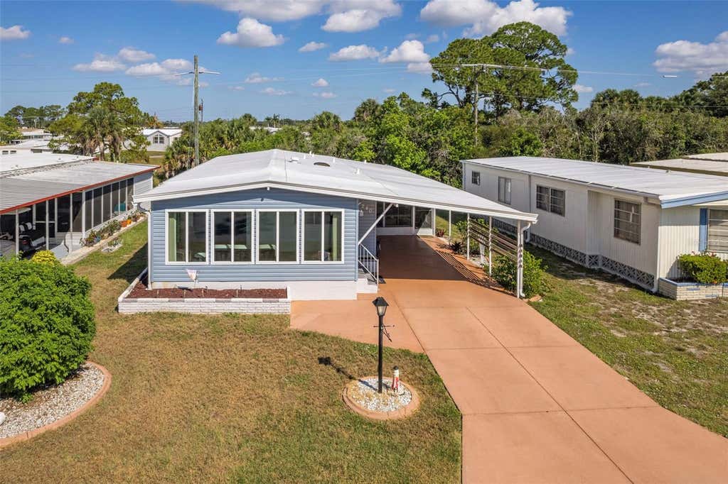 Photo of 240 La Costa, North Port, FL 34287 (MLS # TB8521197)