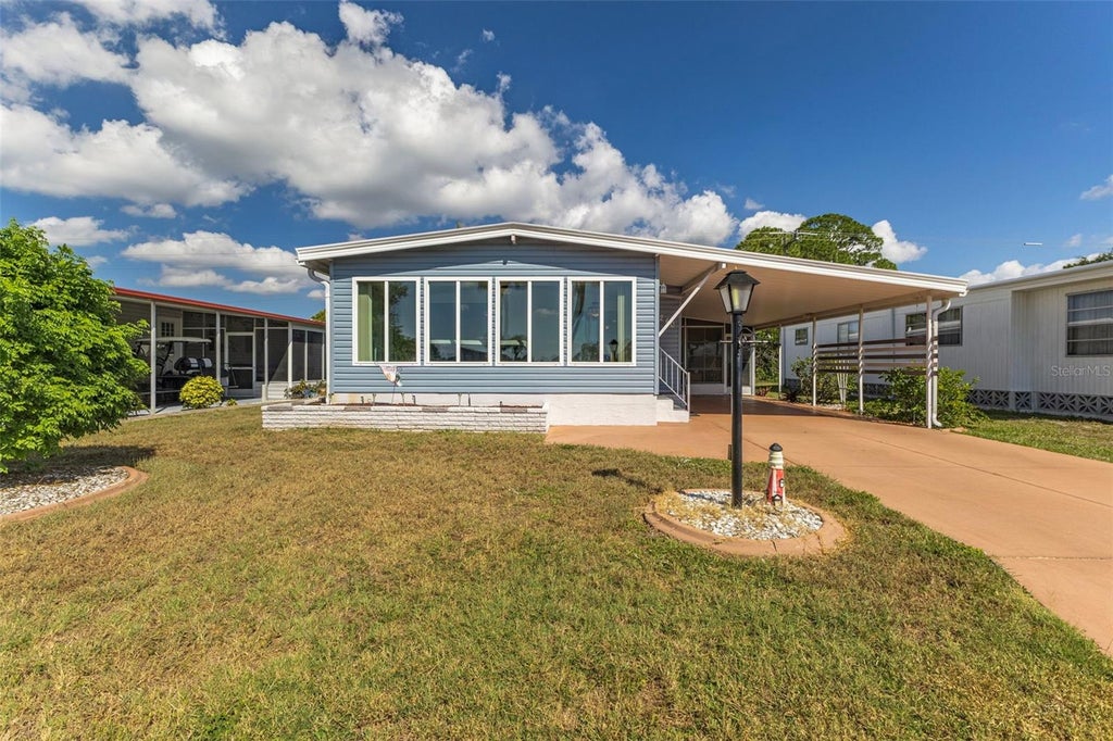 Photo of 240 La Costa, North Port, FL 34287 (MLS # TB8521197)