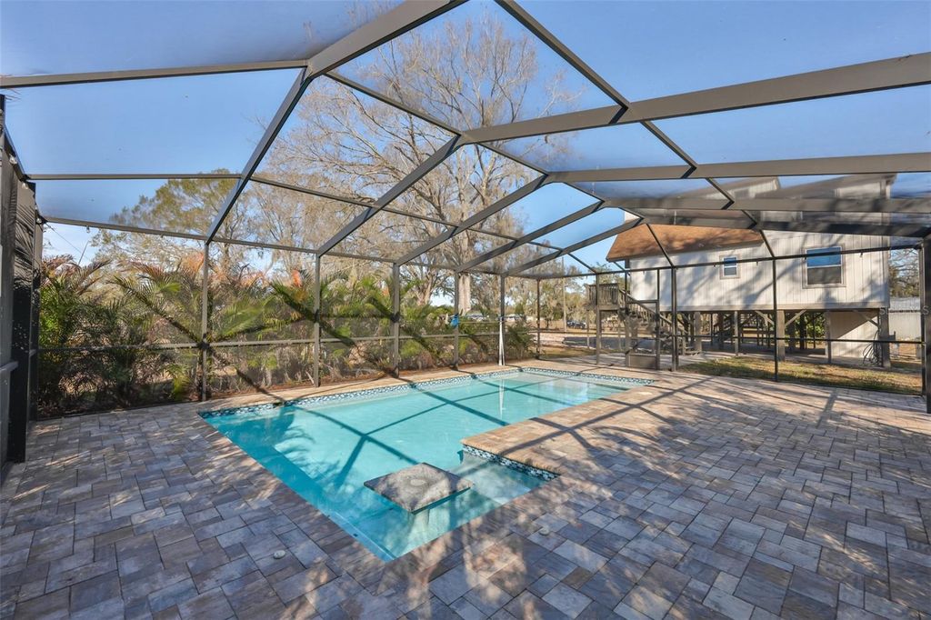 Photo of 18711 Red Bird Lane, Lithia, FL 33547 (MLS # TB8467953)