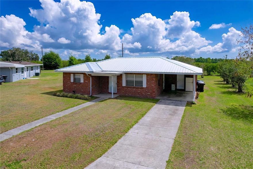 Welcome to 1305 Hickory Lane South in Fort Meade, Florida—a charming red brick home full of warmth, character, and history. Nestled on a spacious one-third acre lot in a quiet subdivision with no HOA, this 3-bedroom, 1-bathroom residence has been lovingly owned by the same family since 1966, holding decades of cherished memories. Over the years, the home has been thoughtfully updated, including improvements to the electrical and plumbing systems, as well as the AC unit and metal roof, offering peace of mind while preserving its timeless appeal. With its inviting charm and solid construction, this property presents an excellent opportunity for a first-time homebuyer looking to establish roots in a peaceful setting.