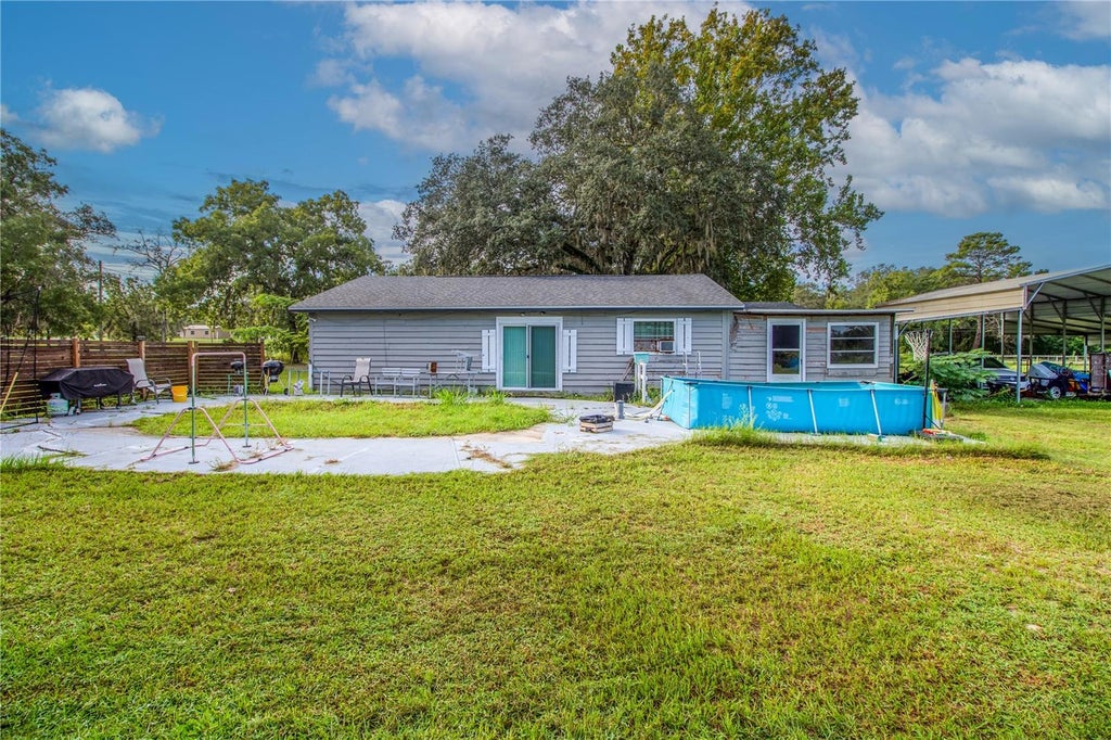 Photo of 10039 May Gold Lane, Spring Hill, FL 34608 (MLS # W7889478)