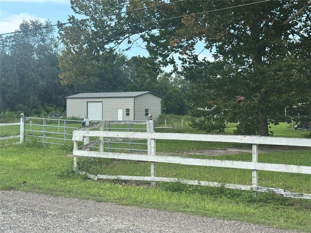 Photo of 10039 May Gold Lane, Spring Hill, FL 34608 (MLS # W7889478)