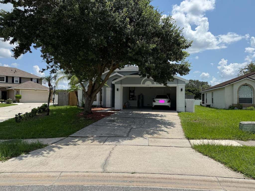 Photo of 154 Woodbury Pines Circle, Orlando, FL 32828 (MLS # S5155780)