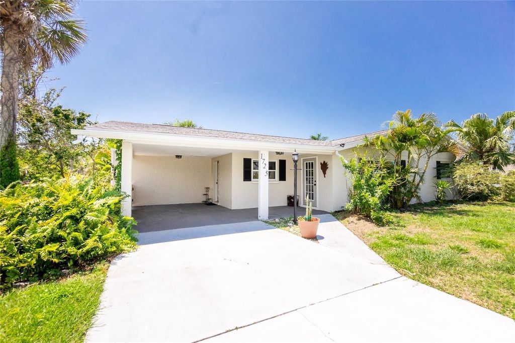 Photo of 1725 Blue Bird Lane, Englewood, FL 34224 (MLS # D6144941)