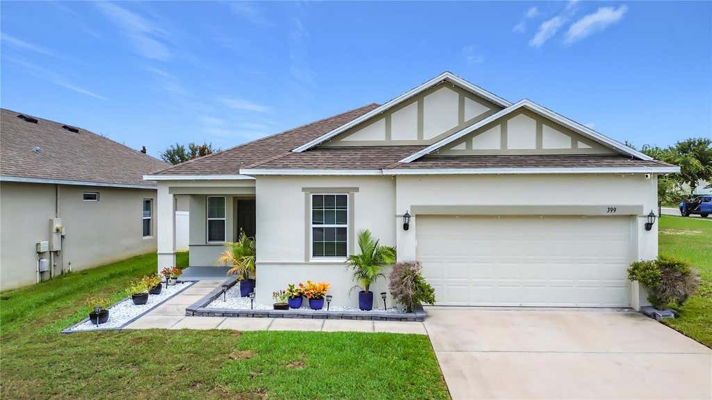 Photo of 399 Pinecrest Loop, Davenport, FL 33837 (MLS # O6429996)