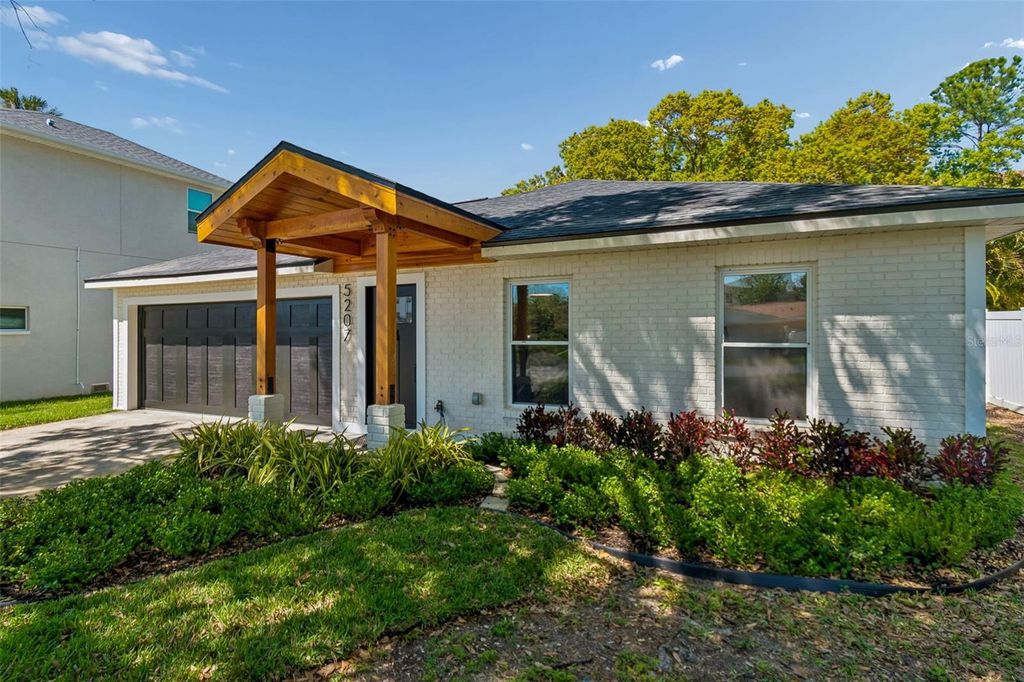 Photo of 5207 W Cleveland Street, Tampa, FL 33609 (MLS # TB8479957)