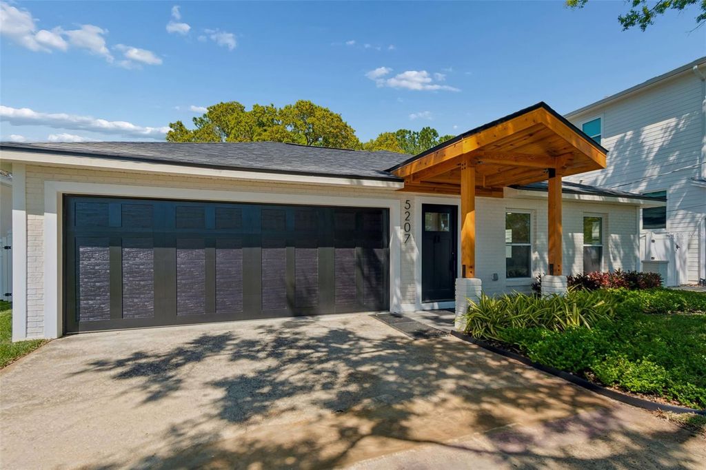 Photo of 5207 W Cleveland Street, Tampa, FL 33609 (MLS # TB8479957)