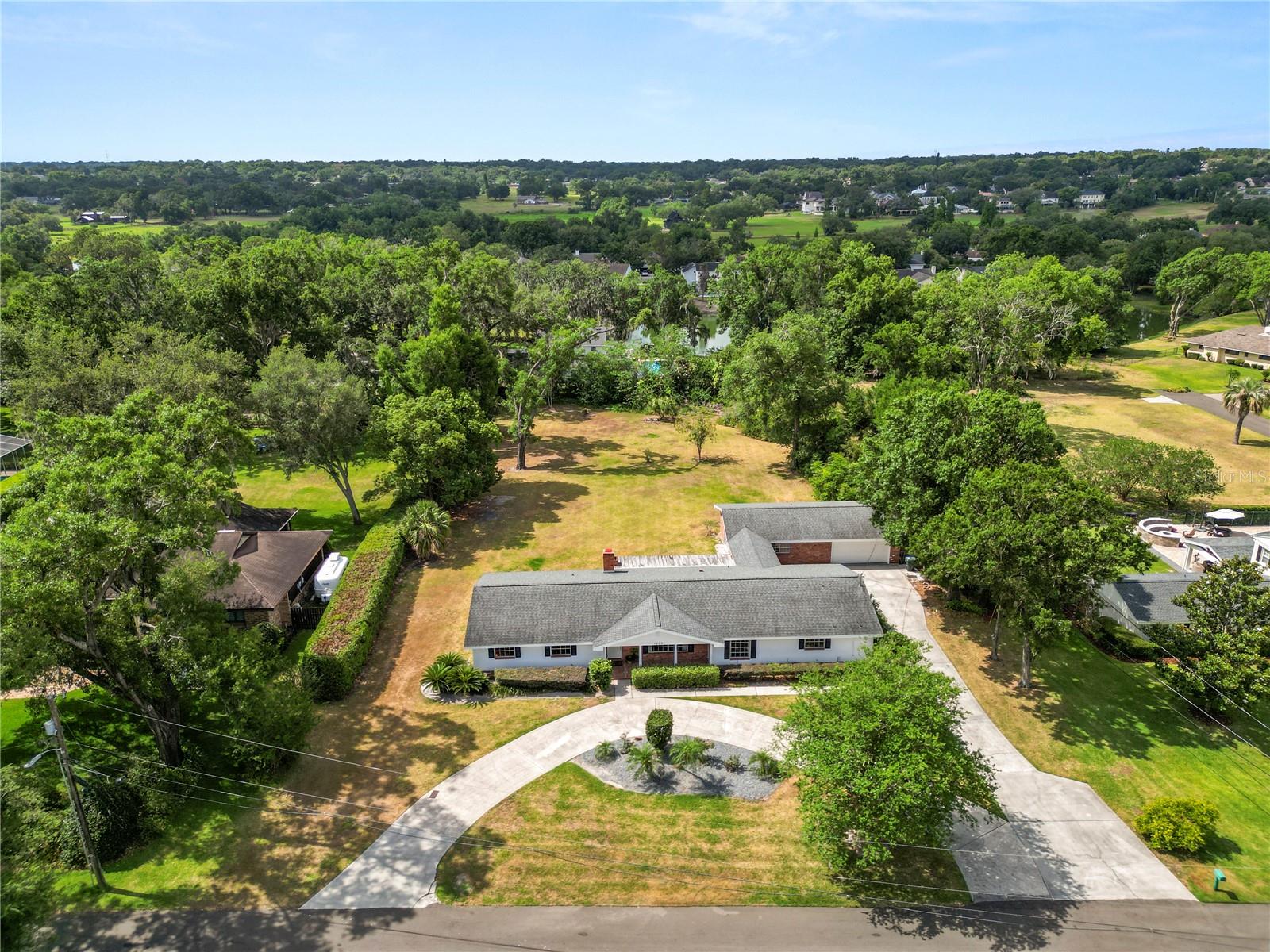 1205 ROLLING WOODS LANE