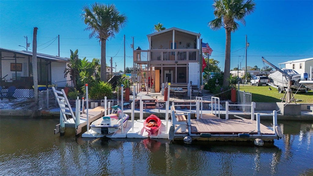 Photo of 6813 Curlew Lane, Hudson, FL 34667 (MLS # OM734606)