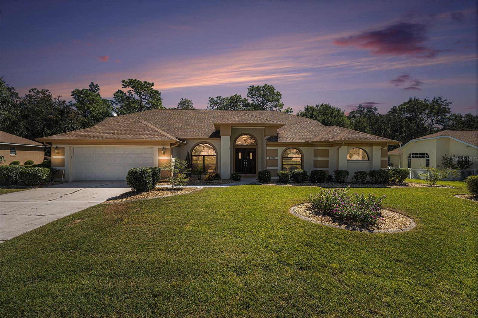 Welcome to this stunning 4-bedroom, 2-bathroom residence, perfectly situated on over a quarter
acre in the highly desirable community of Sugarmill Woods. This home offers the perfect blend
of privacy, elegance, and modern comfort.
Step through the double-door entry and be greeted by soaring 11–14’ ceilings, expansive
sliding glass doors, and abundant natural light that creates a bright, airy ambiance throughout.
The open-concept floor plan showcases **luxury flooring—no carpet anywhere—**combining
style with easy maintenance.
The spacious family room features a cozy fireplace and flows seamlessly into the updated
kitchen and Florida Room, making this home ideal for both entertaining and everyday living.
The chef’s kitchen is a true centerpiece, featuring granite countertops with seating, newer
stainless steel appliances, smart-touch faucet, slide-out cabinetry drawers, and a built-in
pantry. The formal living and dining rooms offer additional gathering spaces, adding
versatility and elegance to the home’s layout.
The primary suite is a luxurious retreat, complete with a tray ceiling, private access to the
Florida Room, and a spa-inspired ensuite bath with a soaking tub, walk-in shower, dual
vanities, makeup area, and a custom walk-in closet with built-ins. The fourth bedroom,
connected to the primary bath, provides the flexibility to serve as a home office, nursery, guest
suite, or even a dream dressing room. Two additional bedrooms are privately located on the
opposite side of the home, sharing a beautifully updated full bath with a glass-enclosed
tub/shower and direct backyard access—perfect for pool or patio days.
A true highlight of this home is the expansive Florida Room—offering over 400 square feet of
insulated, air-conditioned space with high-wind-rated floor-to-ceiling windows and luxury
vinyl plank floors. Enjoy serene garden views year-round in this cool, comfortable
indoor/outdoor retreat—perfect for entertaining or relaxing with your morning coffee.
Additional features include a dedicated laundry room with custom cabinetry, stainless steel
sink, and ample counter space; a fully fenced backyard with lush, fresh landscaping; a fully
irrigated yard powered by a private well (no water bill!); and a two-car garage with built-in
storage and natural light.
With its thoughtful design, premium finishes, and major upgrades throughout, this remarkable
home is truly turnkey and ready for its next owner to experience the best of Florida living in one
of the area’s most sought-after communities.
