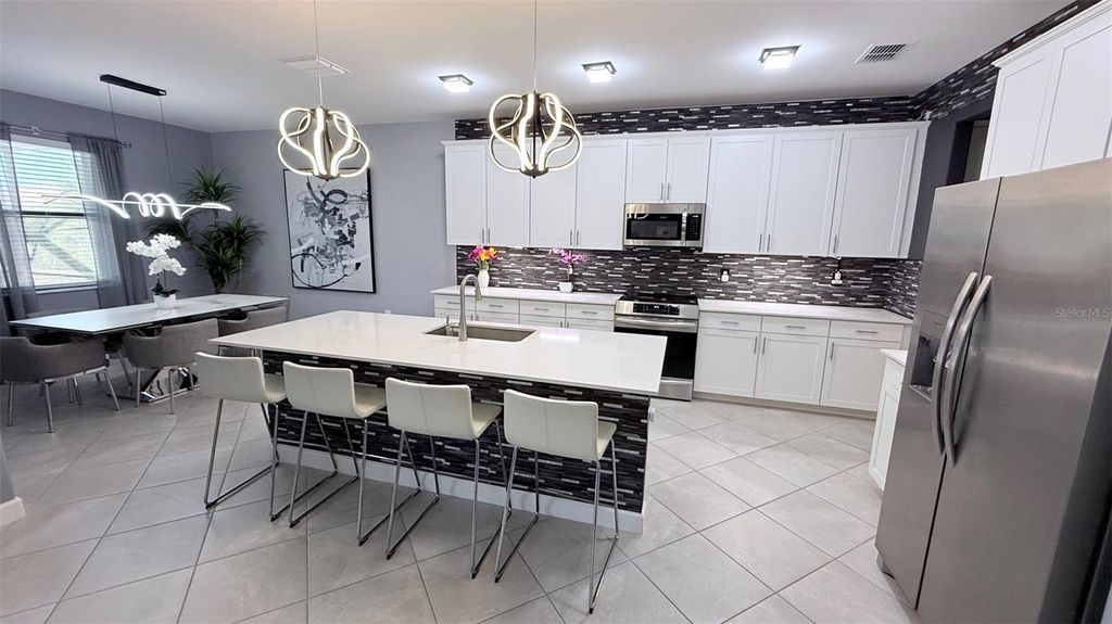 Photo of 4970 Oyster Pearl Street, Bradenton, FL 34211 (MLS # A4672524)