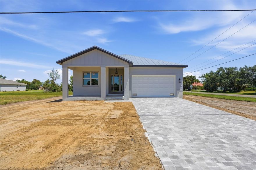 Experience modern Florida living in this brand-new, never-lived-in 4-bedroom, 3-bathroom home with a 2-car garage located in the desirable Burnt Store Lakes community. Thoughtfully designed with a bright open floor plan, luxury vinyl flooring throughout, and elegant tray ceilings, this home offers both style and functionality. Spacious living areas, quality finishes, and a split-bedroom layout create the perfect balance for everyday living and entertaining. With indoor and outdoor spaces designed for comfort, this home is move-in ready and waiting for your personal touch.

RESIDENCE OVERVIEW:
• 4 bedrooms | 3 bathrooms
• 2-car garage
• New construction | never lived in
• Located in Burnt Store Lakes
• Bright open floor plan
• Luxury vinyl flooring throughout
• Tray ceilings

INTERIOR FEATURES:
• Spacious living room designed for entertaining
• Glass slider leading to covered lanai
• In-floor electrical outlets in living room
• Abundant natural light throughout
• Functional split-bedroom layout for added privacy

CULINARY SPACE:
• Kitchen with stainless steel appliances
• Stone countertops
• Large island with breakfast bar seating
• Closet pantry for additional storage
• Open flow to dining and living areas

DINING AREA:
• Dedicated dining space off the kitchen
• Glass slider with access to covered lanai
• Perfect for indoor-outdoor entertaining

PRIVATE OWNER’S RETREAT:
• Spacious primary suite
• Large walk-in closet
• En-suite bathroom featuring:
– Dual sink vanity
– Walk-in shower

GUEST ACCOMMODATIONS:
• One guest bedroom located near primary suite with nearby full bathroom
• Two additional guest bedrooms situated on opposite side of home
• Built-in closets in all guest bedrooms
• Shared guest bathroom for split-bedroom wing

OUTDOOR LIVING:
• Covered patio with room for entertaining
• Backyard ready for your personal vision
• Plenty of potential for outdoor living space or future pool

COMMUNITY FEATURES:
• Burnt Store Lakes is a deed-restricted community
• City water and sewer
• Community playground and park
• Bike path and recreation area
• Convenient access to Burnt Store Marina
• Burnt Store Marina offers:
– Wet slips
– Dry dock storage
– Boat ramp
– Burnt Store Marina Golf & Activity Club
• Located near boating, fishing, and outdoor recreation opportunities

LOCATION HIGHLIGHTS:
• Easy access to Punta Gorda dining, shopping, and entertainment
• Close to Charlotte Harbor and Gulf access boating
• Short drive to local parks, golf courses, and waterfront attractions

A fantastic opportunity to own a beautifully finished new construction home in a peaceful Southwest Florida community—offering modern design, flexible living space, and access to some of the area's best boating and recreational amenities.