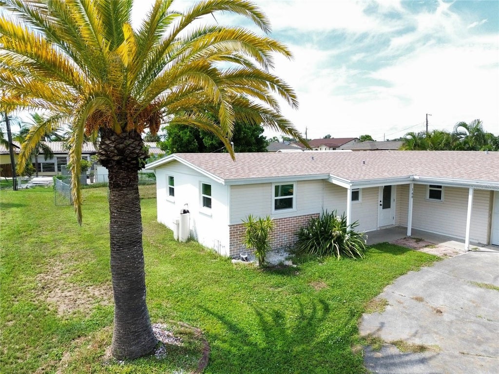 Photo of 160 Francis Drive NE, Port Charlotte, FL 33952 (MLS # A4706153)