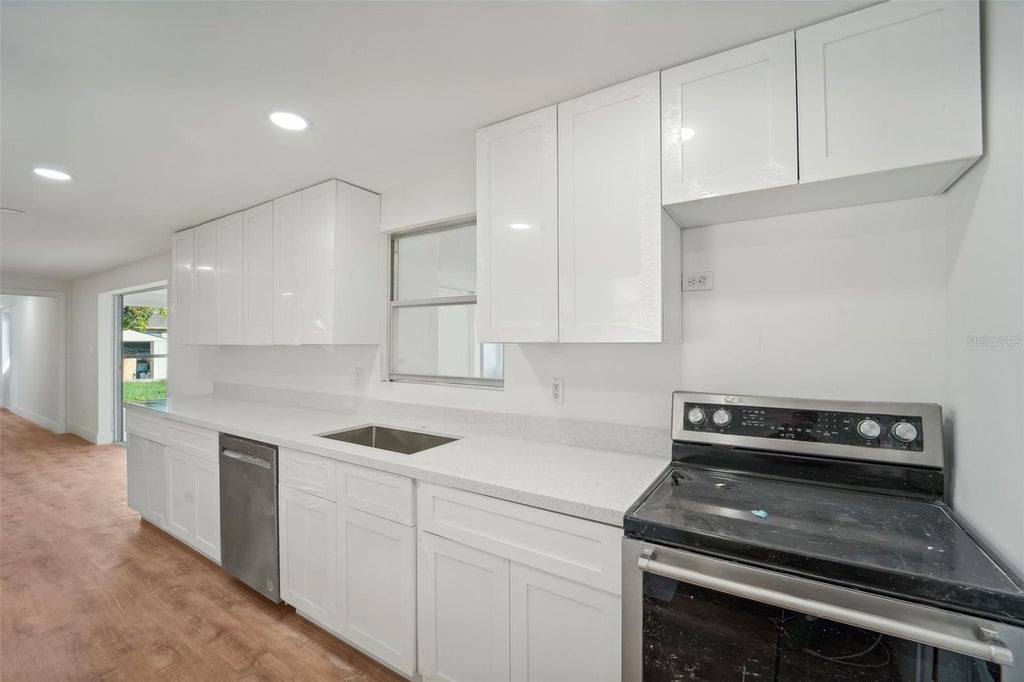 Photo of 160 Francis Drive NE, Port Charlotte, FL 33952 (MLS # A4706153)