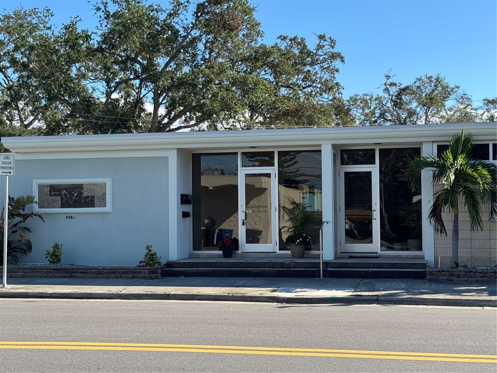 Downtown Clearwater, on a beautiful spacious street, close to everything: Office Suite for Lease – Front Left Office
This office suite is located in downtown Clearwater, an area set for exciting expansion and improvements with areas already being improved. The street is beautiful with plenty of parking and great though traffic, but without the problems of a major road. Perfect for businesses looking to establish themselves in a growing community, this space offers versatility and amenities, but overall visibility with large beautiful front-entry windows.
Key Features:
    •    Open Floor Plan Layout
    •    Private Office
    •   Kitchen area with electrical capacity to accommodate higher power demands
    •    Reception Area with a glass window, perfect for welcoming clients
    •    Private Restroom
    •    Ample Parking: dedicated spaces and free street parking available.
Downtown Clearwater is poised for growth, making this location ideal for brokers, CPAs, chiropractors, flexible office setups, or co-working spaces and more. Also it is located next to a huge new luxury apartment building which increase his location appealing and foot traffic as well. Tenants will be responsible for all utilities.