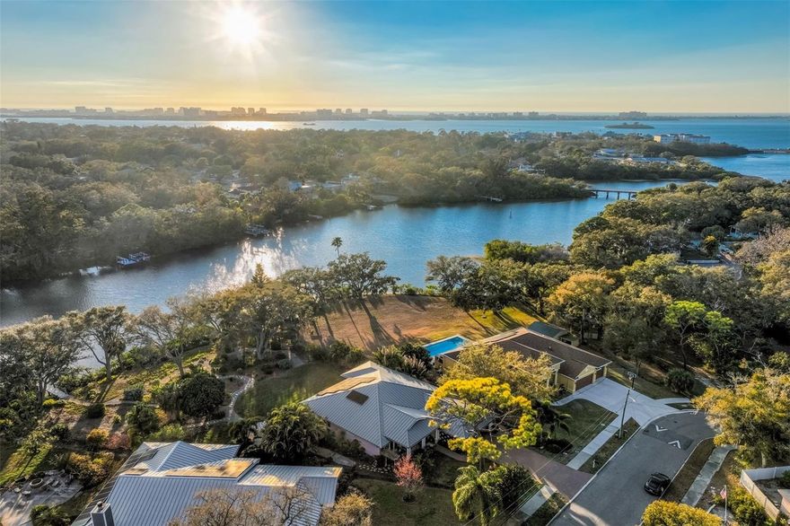 Experience elevated coastal living in this stunning newer-construction waterfront home, perfectly positioned in Clearwater just minutes from the charm and energy of downtown Dunedin. Designed for those who appreciate refined craftsmanship and timeless character, this 3-bedroom, 2-bathroom residence blends modern luxury with historic coastal elegance.

Set on an oversized waterfront lot, the property offers direct water access to the Intracoastal Waterway, complete with a covered 7,000 lb boat lift—ideal for effortless days cruising the coast or heading out for waterfront dining. As an added bonus, the sale includes a 2019, 18.5 ft Tahoe 450 TS bow rider, with a Mercury 115HP four-stroke engine, making this a true turnkey waterfront lifestyle opportunity. Lush, mature landscaping surrounds the home, including established fruit trees that enhance the private, garden-like setting.

Inside, high-end finishes and thoughtful details create a light-filled coastal retreat. Salvaged architectural elements from the iconic Belleview Biltmore Inn add rare character and historic charm, seamlessly woven into the home’s elegant, coastal-inspired design. Every space reflects quality craftsmanship and timeless appeal.

The chef’s kitchen is anchored by a 36-inch, 6-burner Wolf gas range and showcases premium finishes including timeless shaker style cabinets and stone counters. An oversized butler’s pantry provides exceptional storage and additional prep space, keeping everything organized and within reach. Modern efficiencies include solar panels, whole house generator, a durable metal roof, PGT hurricane rated impact windows and sliders, a tankless water heater and whole house reverse osmosis water filtration and softener—combining sustainability with everyday comfort.

Whether enjoying morning coffee overlooking the water, entertaining in the coastal breeze, or heading downtown for dining and festivals, this exceptional home offers the perfect blend of location, luxury, and lifestyle.

This is more than a home—it’s waterfront living at its finest.