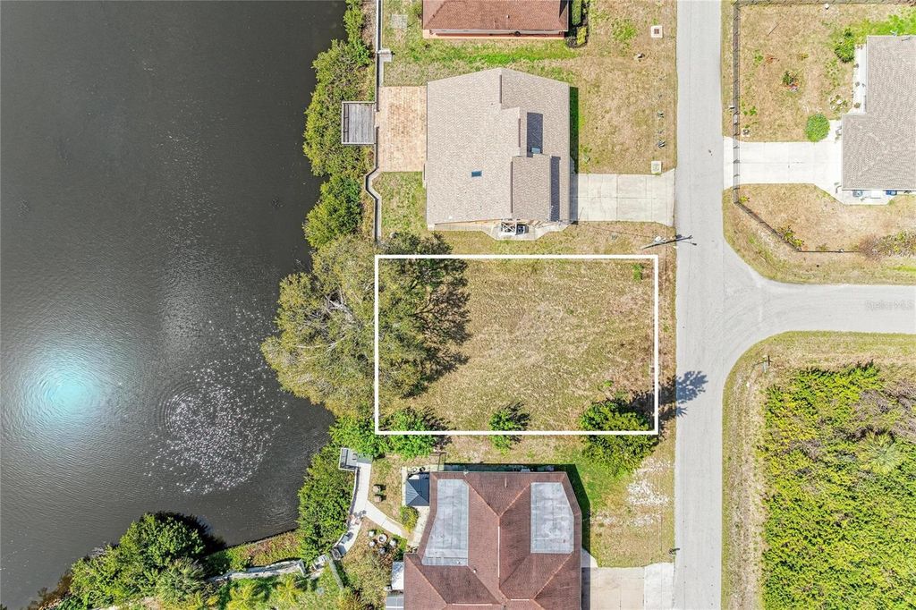 Photo of 12029 Corsica Lane, North Port, FL 34287 (MLS # TB8484134)