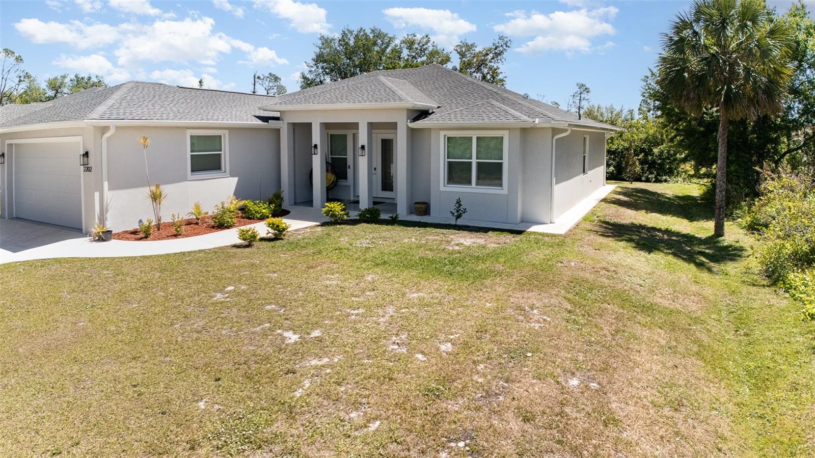 Don't miss out on this immaculate 2022 Custom Built Home!
This Elegant and Modern 3- bedroom, 2-bath home is designed with luxury upgrades throughout. Stylish and spacious, all set in a quiet North Port location. An open, airy floor plan features crown molding, modern lighting fixtures, a coffered ceiling, sleek modern lighting and durable luxury vinyl plank flooring.
The main living room featured coffered ceilings that rise to an impressive 12', creating a luxury look making the space feel both elegant and inviting.
The chef's kitchen is designed to impress with its luxurious quartz countertops, soft-close 42"shaker cabinets that extended an additional 18" for the extra stack storage cabinets, a sleek tiled backsplash ties the space together, complemented by under and above cabinet lighting that creates both functional and ambient illumination. The kitchen is equipped with upgraded Samsung appliances and features a spacious kitchen island, perfect for meal preparation and entertaining. The walk-in pantry included custom-built in shelving, offering even more storage and organization options.
The primary suite is a true retreat, offering a spa-like experience with a freestanding soaking tub and an oversized walk-in shower. The walk- in closet is thoughtfully designed with custom built-ins, providing ample storage and organization with a clean and polished look.
The two additional bedrooms are equally impressive, each featuring built in closets with custom built-in shelving and luxury Vinal flooring, ensures that every bedroom offers a sleek and organized feel.
EXTRA PROPERTY FEATURES! Impact proof glass windows, a whole- house water softener, Concrete sidewalk around the entire home for a clean curb appeal, Seamless gutters with buried downspouts, a separate laundry room with a sink, an extended two car garage and a screened in patio with epoxy flooring.
KEY PROPERTY BENEFITS! No HOA, Not Flood Zone! No deed restrictions! Close to the beaches, Lakes, Golfing, Shopping, Warm Mineral Springs and the North Port Aquatic Center.
All measurements are approximate and should be verified by buyer.