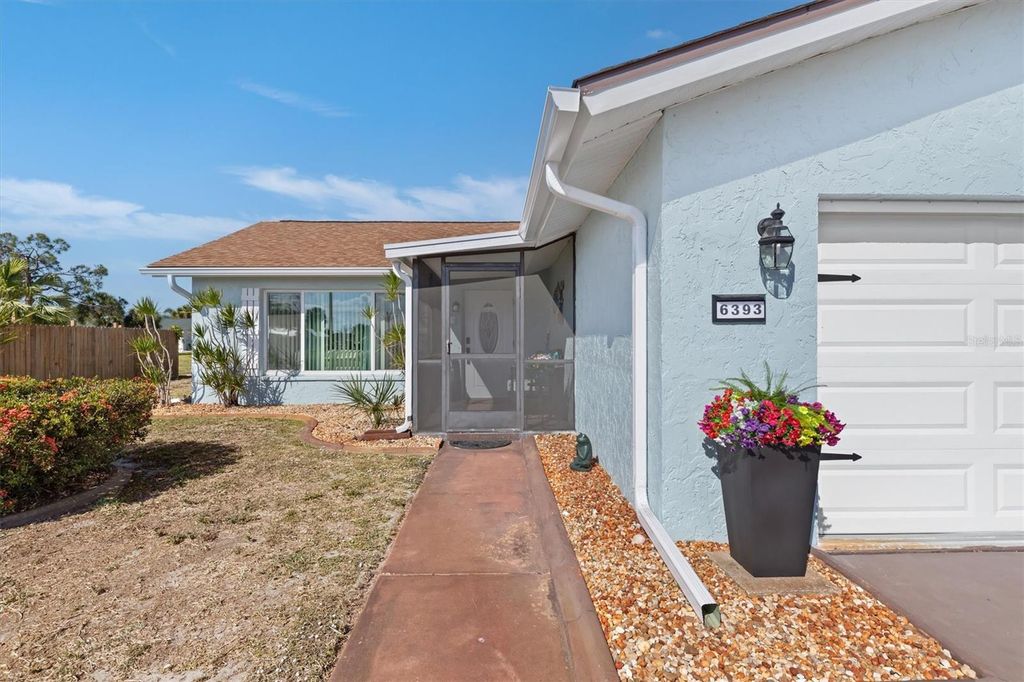 Photo of 6393 Drucker Circle, Port Charlotte, FL 33981 (MLS # TB8501117)