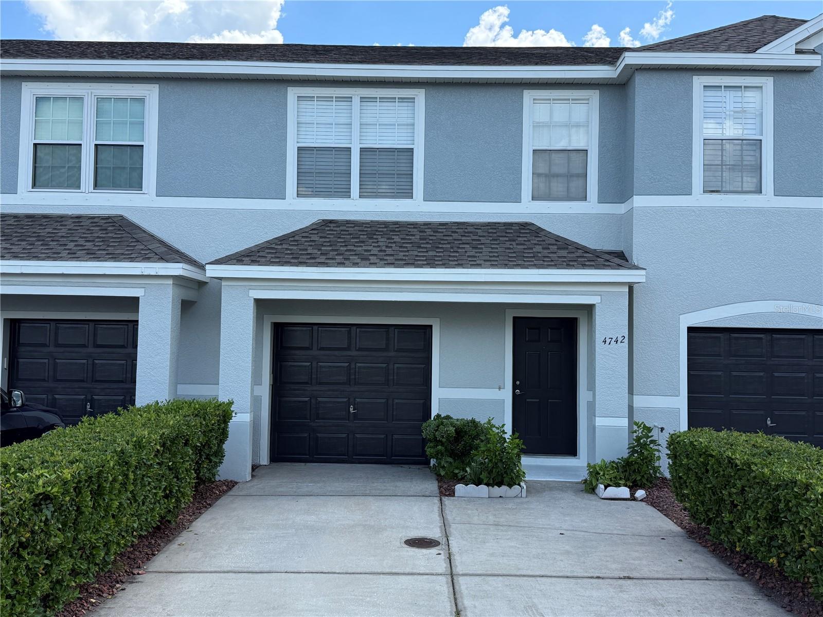 Welcome to Sawgrass Village, a highly sought-after community featuring green spaces, a dog park, and a sparkling community pool. This beautifully maintained 3-bedroom, 2.5-bath townhome offers solid concrete block construction, an attached one-car garage, and a covered, screened patio perfect for relaxing or entertaining. Upstairs, you’ll find three spacious bedrooms, two full bathrooms, and a convenient laundry room. The oversized primary suite includes a walk-in closet and private ensuite bathroom, while two additional bedrooms provide plenty of room for family, guests, or a home office. Recent updates add peace of mind, including a brand-new roof (2025) and a freshly painted exterior/interior. This home also comes with metal storm shutters for extra protection and potential insurance savings. Located in a non-flood zone with a low monthly HOA fee that includes reserves for capital improvements, this move-in-ready townhome offers exceptional value. Ideally situated near shopping, dining, and major highways, you’ll enjoy quick access to St. Petersburg, Clearwater, and Tampa.