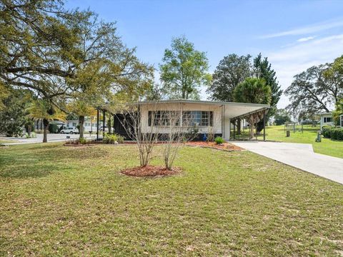 Photo of 8099 Country Club Drive, Brooksville, FL 34613 (MLS # TB8430005)