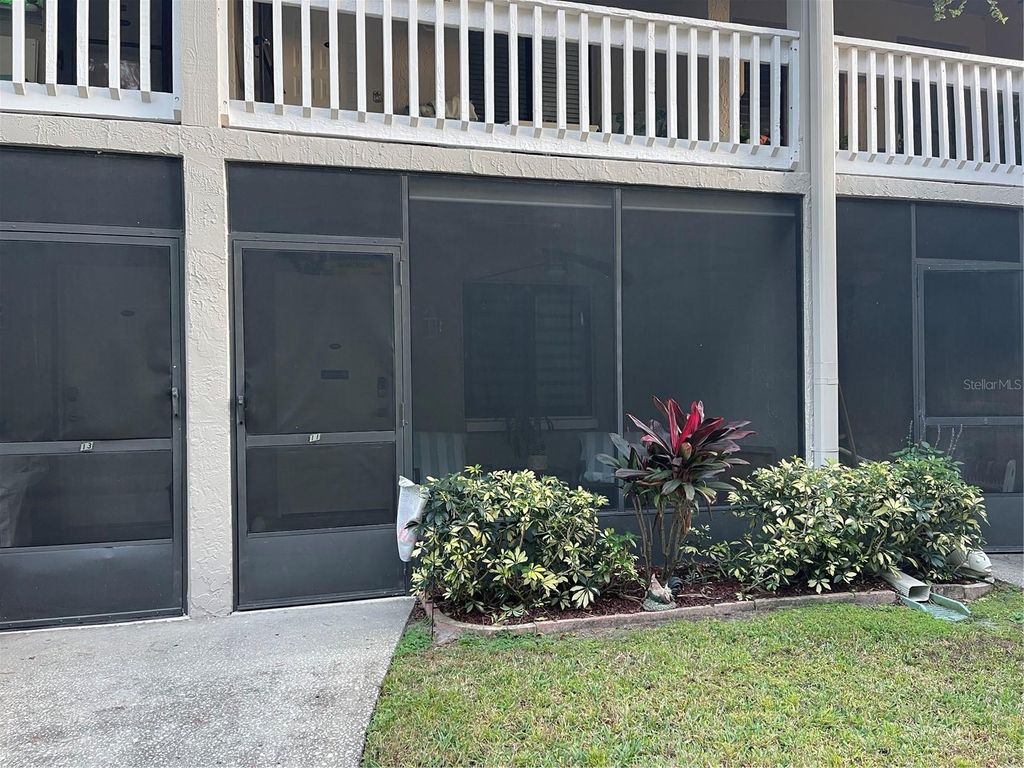 Photo of 20921 Haulover Cove #11, Lutz, FL 33558 (MLS # W7881933)