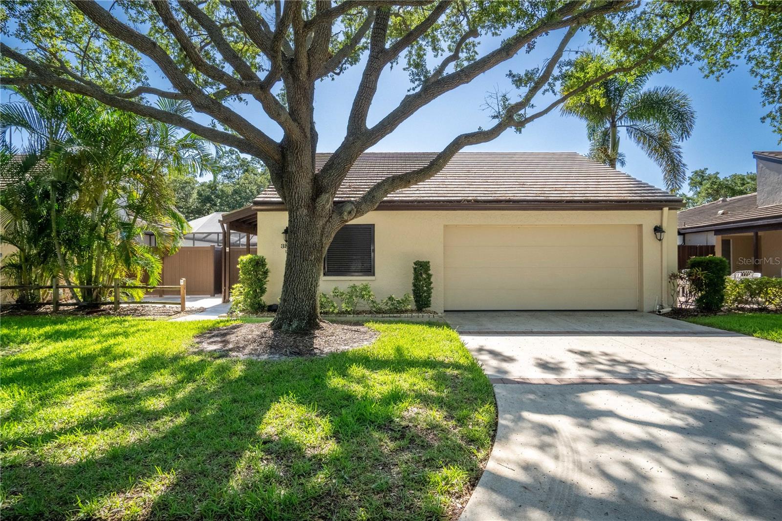 SEASONAL RENTAL: Off-Season rent is $3,500/mo, In-season rent is $6,900/mo. This beautiful Villa in the popular Glen Oaks area is available for your 30 day rental today! With a fully stocked, quartz countertop kitchen, you can entertain and cook for your family and friends while they are splashing happily in the pool right off your kitchen/living area. Two bedrooms, a two car garage, and laundry room right off the living room provides everything for your stay all within reach. Glen Oaks is convenient to shopping, downtown Sarasota, and just 15 minutes from the beach, the famous Ringling Brothers museum, and the Sarasota airport.