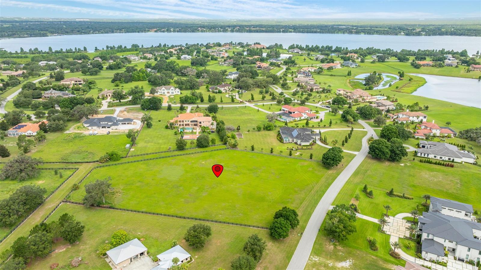 Opportunity to build your dream home in Stonelake Ranch! This 3.3-acre Vacant Lot is available for sale and located in Stonelake Ranch nestled on the shores of Lake Thonotosassa, the largest ski lake in Hillsborough County. This spacious estate-sized lot has plenty of room to build your dream home in one of Tampa’s most sought after gated communities! Conveniently located midway between downtown Tampa and downtown Lakeland Stonelake Ranch amenities include the Lakeside Lodge with fitness center, entertainment center, catering kitchen, community boat ramp, and a spectacular view of the sun setting over Lake Thonotosassa. Next to the lodge is a playground and tennis courts. This community is zoned equestrian with horse trails and a 100-acre meadow preserve. This 680-acre community provides access to 880-acre Lake Thonotosassa as well as 37-acre Lake Hendry where residents can use small non-motorized boats, stand-up paddle boards, canoes, and kayaks for their year-round enjoyment. Stonelake Ranch has a 24-hour staffed entrance gate with roving security at night. Buyer to confirm all sizes and dimensions via a certified survey.