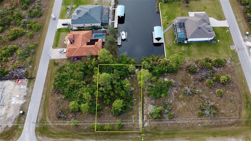 This exceptional WATERFRONT lot in South Gulf Cove offers direct access to Charlotte Harbor and the Gulf of Mexico, making it the perfect spot to build your dream home. Boasting 50 feet of waterfront along the scenic 100-foot wide Applewhite Waterway, you’ll enjoy breathtaking water views and easy access to open water with only one bridge to pass under. City water and sewer are available, providing convenience for future development. South Gulf Cove community is a boater’s paradise, offering over 50 miles of navigable waterways, multiple parks, a playground, a public boat ramp, and sidewalks for outdoor enjoyment. The neighborhood’s voluntary HOA offers membership for just $120 per year, providing additional amenities and services. You’ll be just 20 minutes from the beautiful beaches of Boca Grande Island, short drive to shopping and dining, golf courses, fishing and everything SWF has to offer. With new home construction booming in the area, property values are on the rise, making this a great time to invest before prices climb further. The adjacent lot is also available for purchase, offering even more potential (MLS# N6143705 / 10273 St. Paul Dr). Don’t miss out on this opportunity to own a piece of paradise!