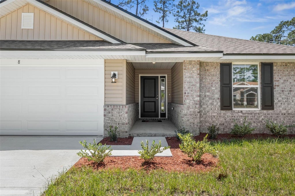 Photo of 23 Pretoria Lane, Palm Coast, FL 32164 (MLS # FC320009)