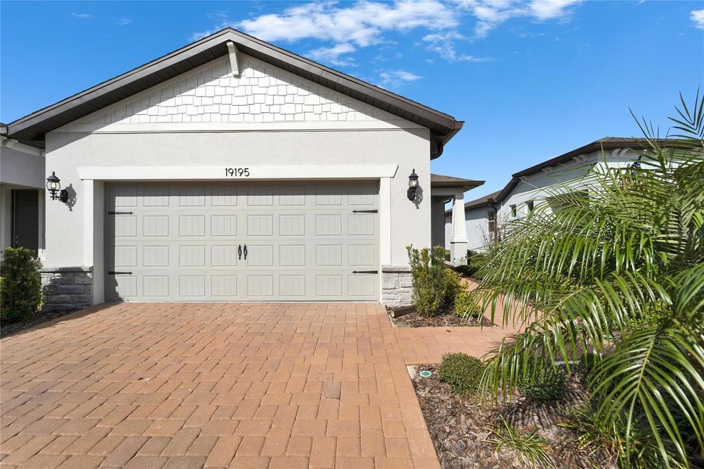 Photo of 19195 Iron Topsail Isle, Land O Lakes, FL 34638 (MLS # S5121684)