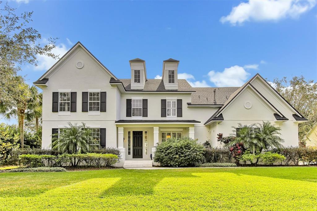 One or more photo(s) has been virtually staged. Welcome to KEENES POINTE, 24hr guard gated, highly desired neighborhood in Windermere Florida. Uniquely accented by award winning Jack Nicklaus Signature 18 hole Golf Course and the Golden Bear Country Club. Step into this custom 5br /4ba David Weekley home with golf view of the 3rd hole green. Enter through a magnificent two story foyer, and a dramatically rounded staircase. Off the foyer on your left is the formal living room and dining room. Proceeding through the foyer you enter the surround sound equipped family room with a custom stone gas fireplace. Overlooking the family room is the spacious gourmet kitchen which is a chef's dream! It is equipped with new appliances, cabinets, wine fridge, ice maker and oversized island make it the perfect area for entertaining. First floor Master suite with hardwood floors, large master bathroom with two sinks, jet tub, separate shower & toilet area, spacious walk-in closet. 2nd floor access to 4 spacious bedrooms with two full bathrooms. Large upstairs game/study loft with separate media/theater room with 4k projector and surround sound. Enjoy a relaxing day in your incredulous screen enclosed pool deck, boasting a spectacular 40'x19' heated pool. A separate Jacuzzi, full summer kitchen, pergola, with a retractable screen leading to the custom beach volley ball / beach tennis court with outdoor shower. Amenities including: Jack Nicklaus Golf Course, Golden Bear Club with pool, fitness center, playgrounds, tennis courts, lake access and many events and activities. (Golden Bear Club Memberships available for additional fee.) Recent roof replacement in 2021. Tesla Charger Installed. Owner financing available to qualified buyers. Hurry and schedule your showing, this one will not last.