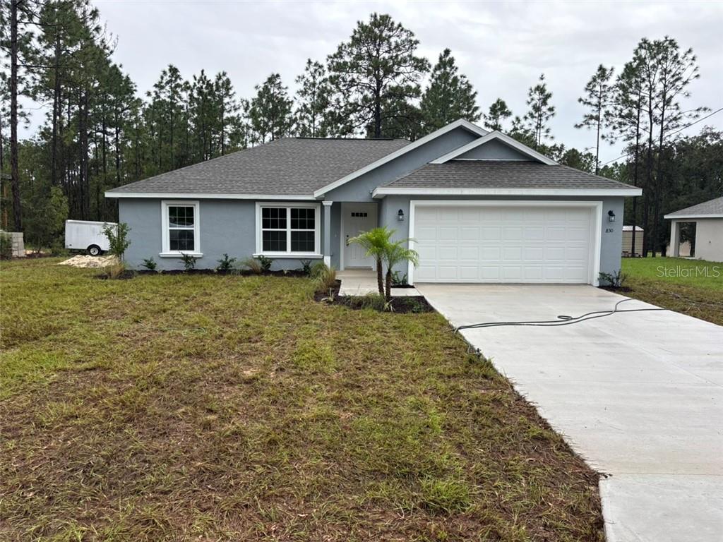 Photo of 830 W Hemlock Drive, Dunnellon, FL 34434 (MLS # CC858462)