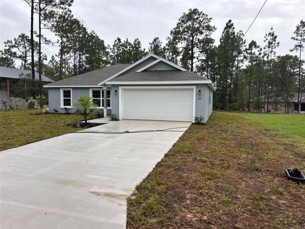 Photo of 830 W Hemlock Drive, Dunnellon, FL 34434 (MLS # CC858462)