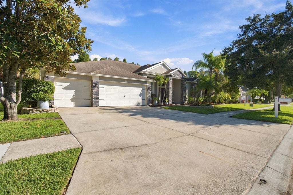 Photo of 26221 Sword Dancer Drive, Wesley Chapel, FL 33544 (MLS # TB8550946)