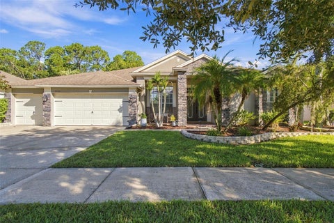 Photo of 26221 Sword Dancer Drive, Wesley Chapel, FL 33544 (MLS # TB8550946)